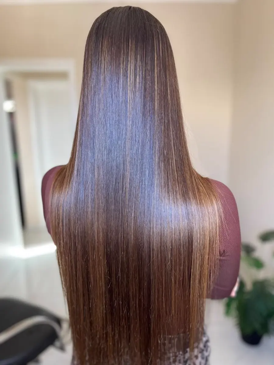 Progressiva em cabelo castanho longo